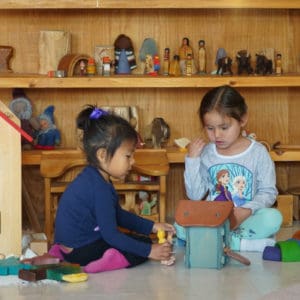 Kindergarten students with toys